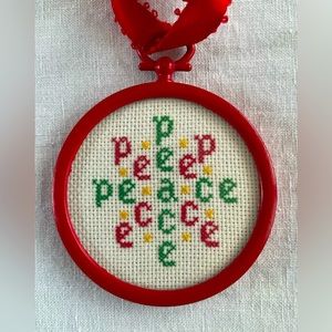 Vintage 1980s Ornament - "Peace" Cross Stitch in Red, Green, and Gold in EVC